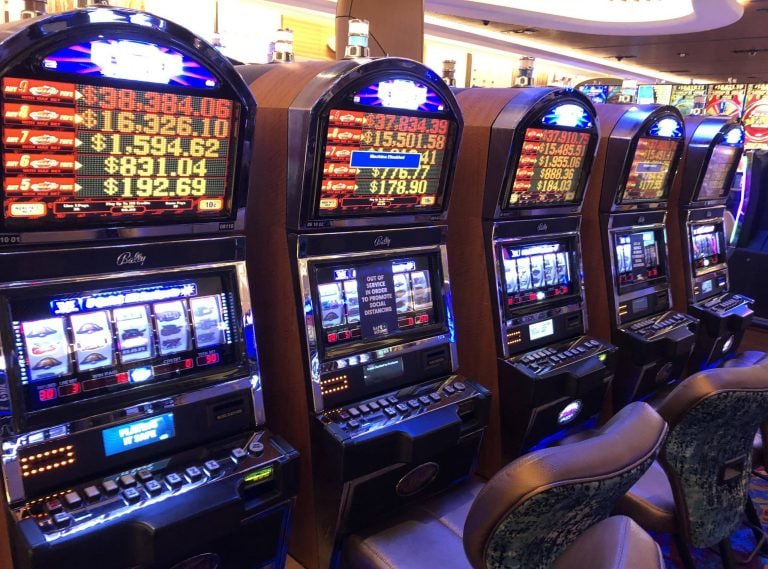 Live blackjack dealer at gila138 login card table with real cards and multi-camera feed